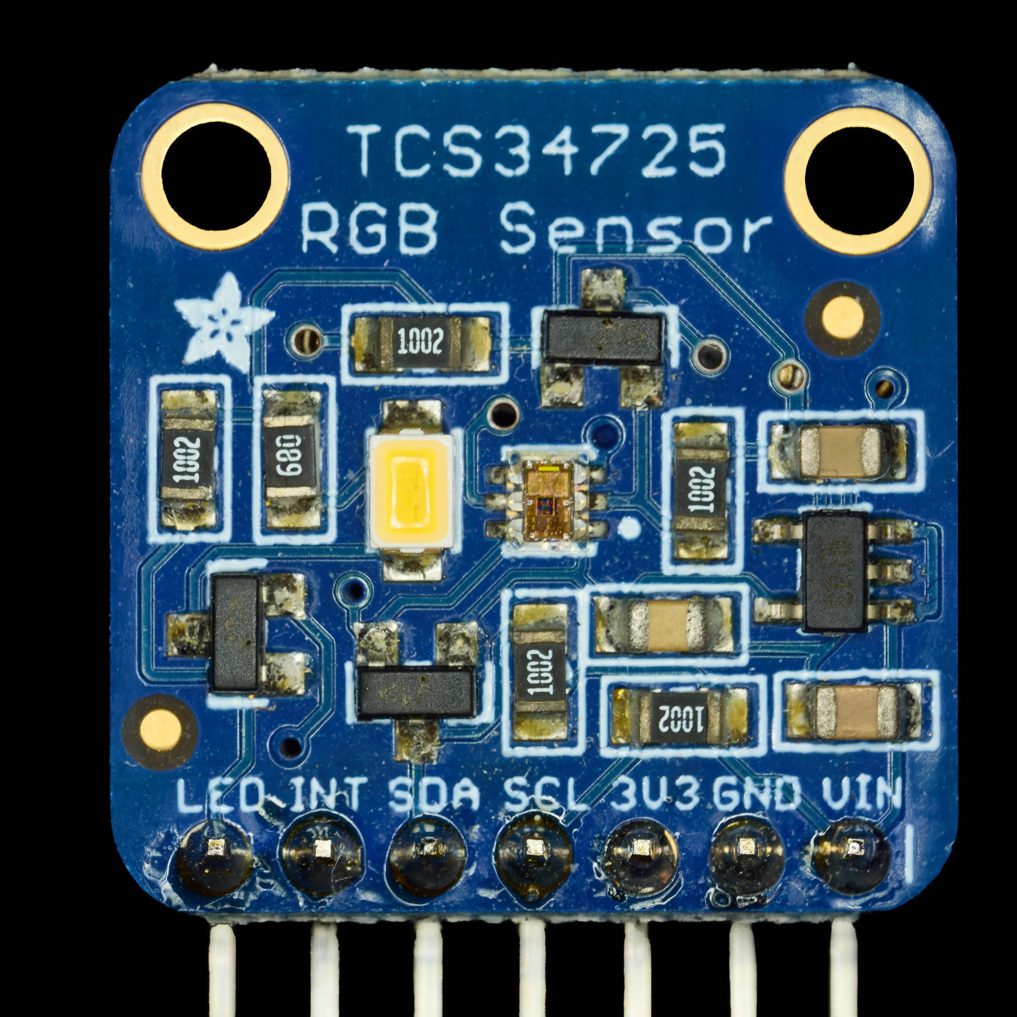 Photograph of breakout board with sensor, LED and other components